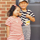 My sister and me. To add my own flavor into my mother-picked, sibling-matched fashion sensibilities, I tried to make “tucking your favorite game’s strategy guide into your waistband” a thing. Needless to say, it did not catch on.